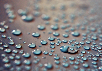 Photo of water droplets pn a surface