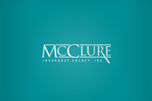 Photo of the McClure logo on a teal background