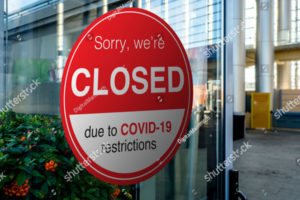 Photo of a red and white "closed" sign