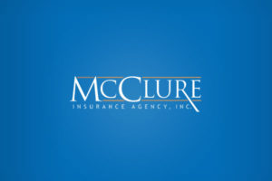 Photo of the McClure logo in blue