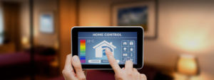Image of a person using a smart home app on a tablet